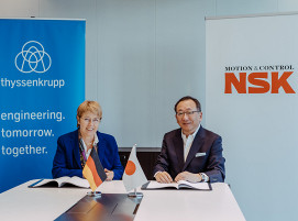 thyssenkrupp CEO, Martina Merz, und Saimon Nogami, Executive Senior Vice President von NSK Ltd., unterzeichnen MoU.